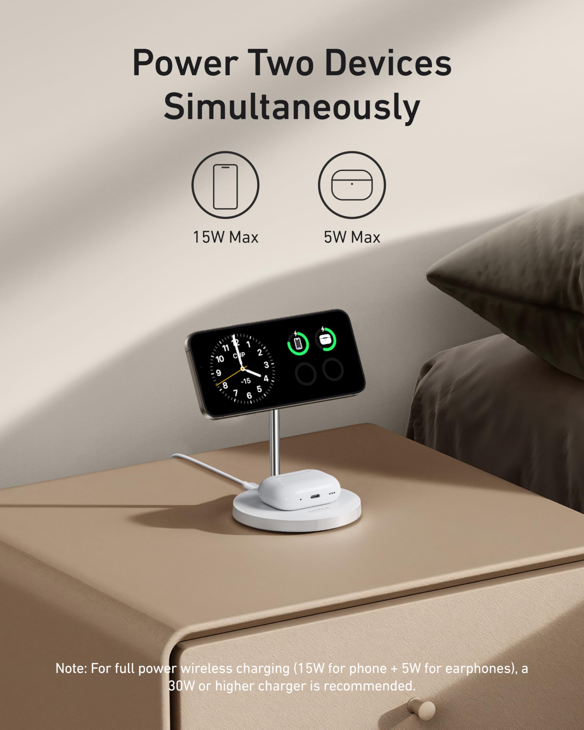 Anker with phone and earphones charging simultaneously