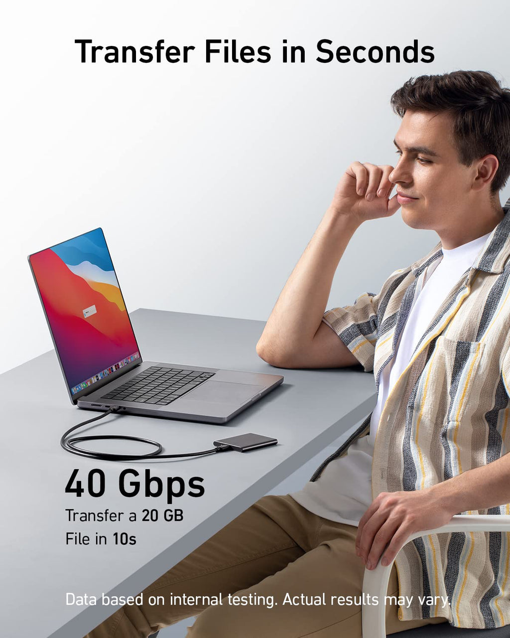 Anker cable with laptop for fast 40Gbps file transfer