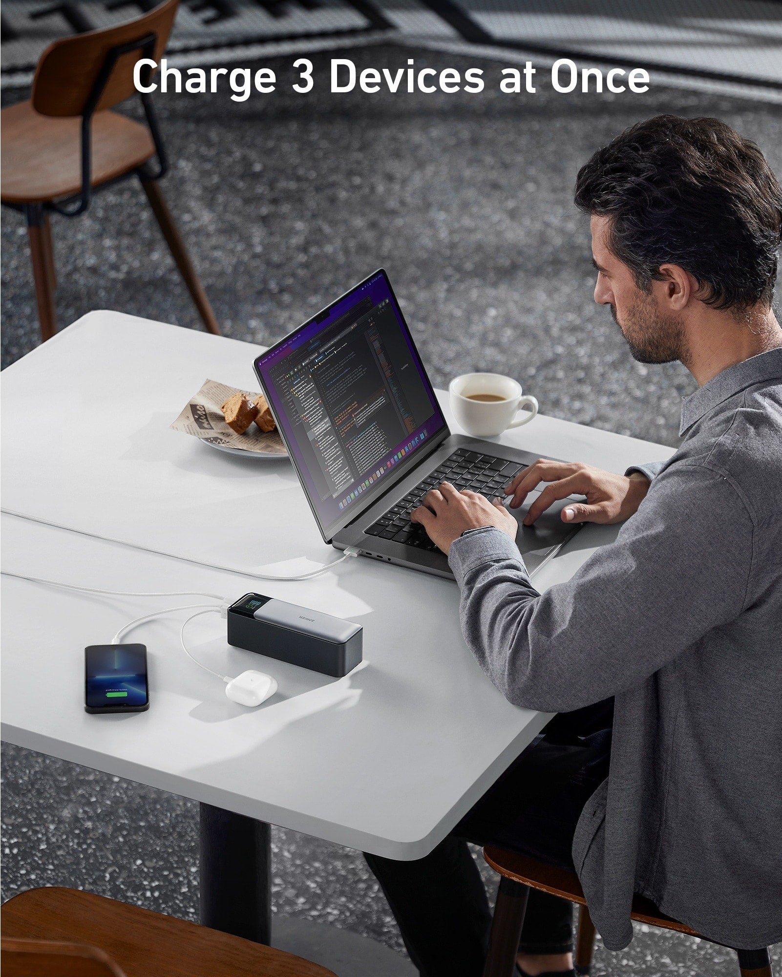 Anker charging 3 devices with laptop and coffee