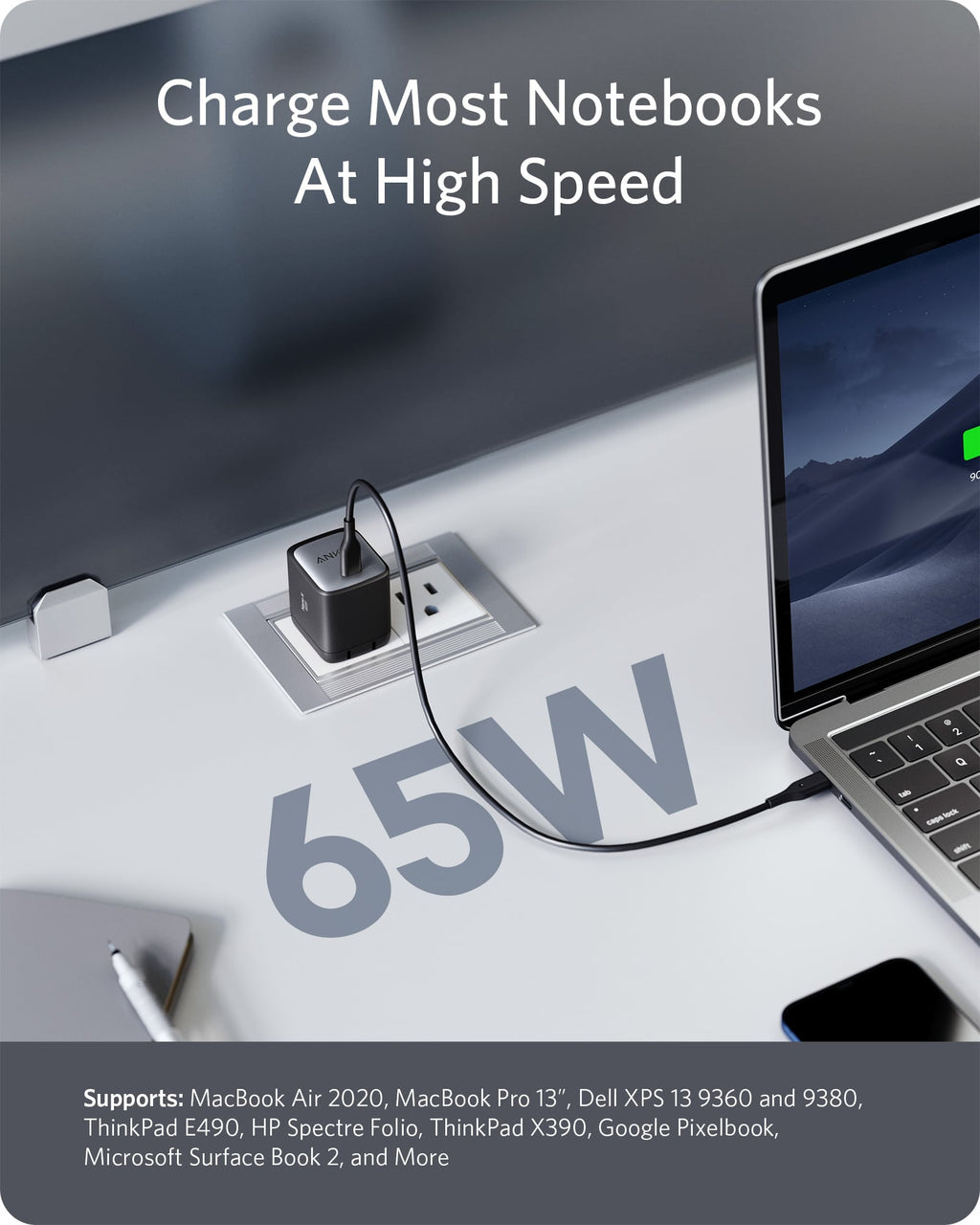 Anker charger powering a notebook with 65W high-speed charging