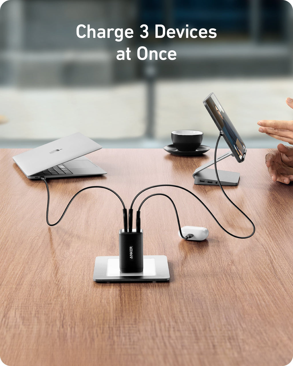 Anker charger with three cables for charging multiple devices.